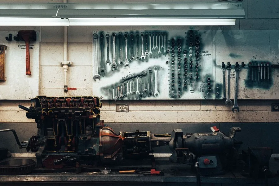 The parts and tool wall above the workbench